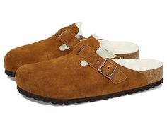 Birkenstock Boston Shearling - Suede (Unisex) - Clog Shoes : Mink Suede : The Boston Shearling - Suede from Birkenstock clog, made cozy for the colder months. Classic suede lends a velvety feel that continues on the inside. The style is fully lined in genuine shearling, right down to the original contoured footbed. A soft, supportive landing every time. Suede upper with a matching adjustable strap. Anatomically correct cork footbed, crafted from cork that is 100% renewable and sustainable, encou Winter Suede Clogs With Rubber Sole, Winter Shearling Slip-on Mules, Winter Leather Footbed Slip-on Mules, Brown Closed Toe Mules For Winter, Winter Brown Closed Toe Clogs, Winter Leather Footbed Slip-on Clogs, Winter Brown Clogs With Cushioned Footbed, Winter Slip-on Clogs With Leather Footbed, Winter Brown Mules With Cushioned Footbed