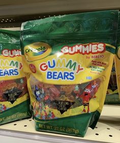 three bags of gummy bears are on the shelf