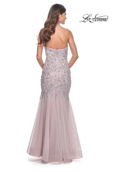 Indulge in the ethereal beauty of the La Femme 32197 Beaded Dress from the Spring 2024 evening collection. With intricate beadwork and delicate details, this masterpiece exudes a mesmerizing charm. Perfect for glamorous galas or romantic date nights, embrace your inner goddess and enchant the world in this flattering silhouette. Elegant Tulle Evening Dress With Sequins, Elegant Embellished Tulle Gown, Embellished Tulle Evening Dress, Formal Evening Dress With Rhinestones And Sweetheart Neckline, Beaded Evening Dress With Fitted Bodice For Prom, Beaded Evening Dress For Prom Season, Sparkling Sweetheart Neckline Evening Dress For Gala, Embellished Tulle Evening Dress For Formal Events, Embellished Tulle Evening Dress For Formal Occasions