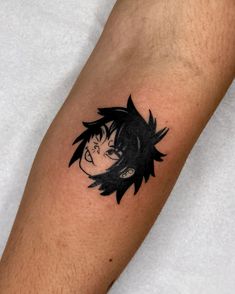 a person with a tattoo on their arm