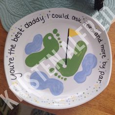 a white plate with a green and blue design on it that says, you're the best daddy i could ask anyone to do