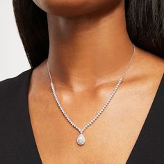 Exude an elegant vibe when you wear this pear-shaped lab-created diamond drop necklace. Fashioned in cool 10K white gold A double frame of lab-created diamonds surrounds the 1/2 ct. pear-shaped lab-created diamond drop. Round lab-created diamonds line half the length of the design in sparkle. Radiant with 2 cts. t.w. of lab-created diamonds This adjustable 18.0-inch cable chain necklace secures with a lobster claw clasp. Exquisite Pear-shaped Diamond Necklace For Formal Occasions, Exquisite Pear-shaped Diamond Necklace For Formal Events, Classic Pear-shaped Bridal Necklace With 17 Jewels, Elegant Pear-shaped Bridal Necklace For Formal Occasion, Elegant Drop Diamond Necklace For Wedding, Fine Jewelry Pear-shaped Drop Necklace For Formal Events, Exquisite Drop Diamond Necklace For Formal Occasions, Exquisite Diamond Drop Necklace For Formal Occasions, Elegant Oval Drop Necklace For Anniversary