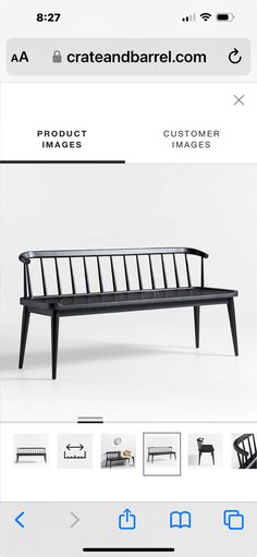 a black bench sitting on top of a white table