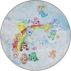 a round rug with teddy bears and rainbows in the sky on top of it