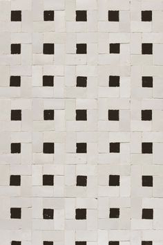 black and white tile with squares on it