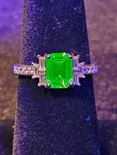 This beautiful, vintage Uranium glass stone is a 8x6.5  mm emerald cut and has little white topaz emerald cut stones on the sides as accents. The stones are mounted in a new sterling silver ring and is available in size 5 through 10.5. Check out my other Uranium glass jewelry, and I do special orders Two Tone Engagement Rings, Silver Smithing, Engagement Ring For Her, Emerald Cut Rings, Diamond Promise Rings, Glass Ring, Silver Signet Ring, Silver Spinner Rings, Linking Rings