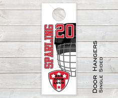 a door hanger with an image of a goalie helmet and the number 20 on it