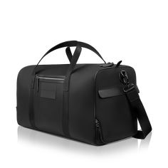 Immerse yourself in sophistication with this duffle bag, hand-crafted with Ballistic Nylon and Premium Full Grain Leather accents. Elevate your journey, whether it's a weekend escape or a spontaneous adventure, with the perfect companion that seamlessly combines style, durability, and timeless elegance. Luxury Nylon Travel Bag For On-the-go, Nylon Weekender Bag With Adjustable Strap For Travel, Modern Gym Bag With Adjustable Strap For Travel, Nylon Weekender Bag With Adjustable Strap For Overnight Trips, Modern Travel Bag With Adjustable Strap For Overnight Trips, Modern Weekender Bag With Adjustable Strap For Overnight Trips, Nylon Satchel Travel Bag, Modern Duffle Bag With Adjustable Strap For Overnight Trips, Modern Leather Trim Duffle Bag For Overnight Trips