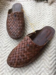 Mens brown woven mules,womens slide sandals, slip ons,summer flip flops,beachwear,indian handmade,authentic,ethnic,back open,fathers day gift,gifts for dad,gifts for him THESE ARE THE MOST COMFORTABLE LEATHER SLIDES YOU WILL EVER WEAR. ^ MYTH BUSTERS : 1.Pure Leather is water resistant and not water proof! 2.You will come across various benefits of leather but the most prominent one is that it gradually takes shape of one's feet unlike other materials and also has an very peculiar characteristic Brown Slippers, Leather Slippers For Men, Myth Busters, Womens Slides Sandals, Women Slides, Authentic Indian, Leather Slippers, Womens Slides, Leather Slides