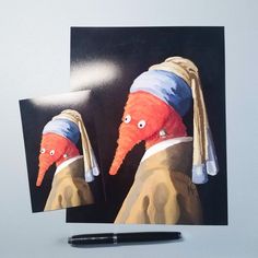 two paintings of carrots with hats on their heads and one has a pen in front of it