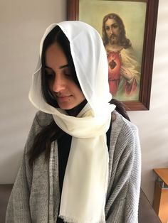 This chiffon cream scarf style veil, is a perfect fit around the face. It is a beautiful and complimenting transparent cream colour. It sits very well on the head due to its texture, which means it doesn't fall off. It is long enough to wrap around the face, it also has the the option to leave open and cover all the back and shoulders well if desired! This is already a favourite veil for many women! Totus Tuus Maria 🙏🏻. Scarf Veil, Cream Scarf, Wedding Veil Accessories, Scarf Style, Cream Colour, Chiffon Scarf, Wedding Veils, Very Well, Scarf Styles