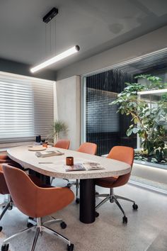 a table and chairs in an office setting