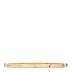 This is an authentic CARTIER 18K Yellow Gold Small LOVE Bracelet size 17. The bracelet is crafted of 18 karat yellow gold and features the signature LOVE screw motif engraved throughout a hinged bangle. Love Bracelet, Hinged Bangle, Love Bracelets, Bracelet Sizes, Cartier, Screw, Bangles, Yellow Gold, Bracelet