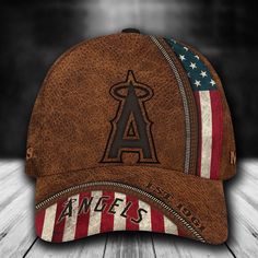 a baseball cap with the los angeles angels on it and an american flag painted on it