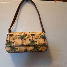 Nwot Liz Claiborne Palm Tree With Pineapples Woven Purse Handbag Shoulder Bag. This 9" X 4" Purse Is In Excellent New Condition. Perfect To Keep Or Give As A Gift. Has 1 Zippered Compartment Inside. Leather Strap, Pineapple Charm. Non Smoking Home. Summer Shoulder Bag With Bamboo Handle And Palm Leaf, Natural Palm Leaf Shoulder Bag With Bamboo Handle, Lei Purse, Everyday Palm Leaf Shoulder Bag, Bohemian Palm Leaf Basket Shoulder Bag, Bohemian Palm Leaf Rectangular Shoulder Bag, Liz Claiborne, Palm Trees, Purses And Handbags