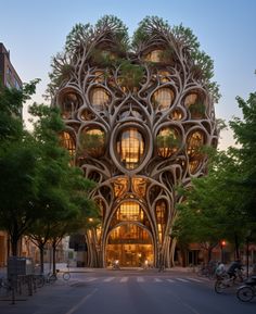 the building is shaped like a bird's nest with trees growing out of it