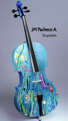 a blue violin with an underwater scene painted on it's body and the bow