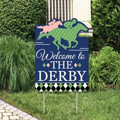 a welcome to the derby sign in front of some bushes