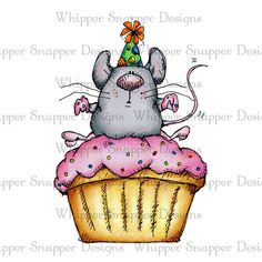 a mouse on top of a cupcake wearing a party hat