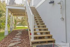 there is a set of stairs leading up to the house