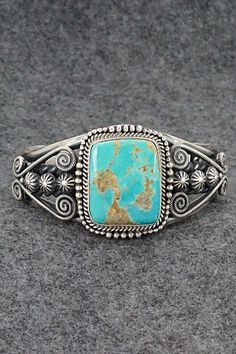 This beautiful and substantial Royston turquoise and sterling silver bracelet was made by Navajo silversmith Michael Calladitto. The back is signed M&R Calladitto, Navajo and stamped .925. Size: 5 1/2" (will fit up to a 6 7/8" wrist) Gap: 1 3/8" Width: 1 1/2" Free shipping on all orders! We ship with USPS and always include tracking. All orders ship within a day of payment. Returns are accepted up to 30 days after you receive your order. Just send us a message. Our shop offers cash back or store Royston Turquoise, M R, American Jewelry, Cuff Bangles, Sterling Silver Bracelet, Bracelets And Charms, Native American Jewelry, Silver Cuff, Turquoise Sterling Silver