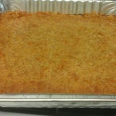 an uncooked casserole in a pan on top of a stovetop