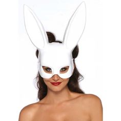 a woman wearing a white bunny mask on her head