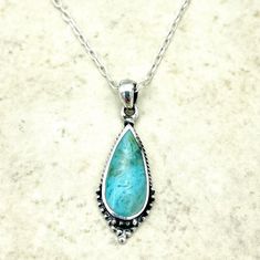 Discover the perfect blend of sophistication and bohemian charm with our Sterling Silver Turquoise Teardrop Pendant--a piece destined to become the centerpiece of your jewelry collection. Handcrafted with meticulous attention to detail, this pendant features a vibrant turquoise stone, renowned for its deep connection to tranquility and protection. Encased in a sterling silver teardrop frame, the gemstone exudes a serene beauty that captivates the eye and soothes the soul. Let this exquisite pendant be a testament to your refined taste and a reflection of your inner grace. With its enchanting color and timeless design, the Sterling Silver Turquoise Teardrop Pendant is more than just an accessory; it's a keepsake to be cherished for years to come. Measuring approximately 0.45 inches in width Bohemian Teardrop Necklace With Oxidized Finish, Bohemian Teardrop Necklaces With Oxidized Finish, Bohemian Oxidized Teardrop Necklaces, Bohemian Sterling Silver Teardrop Pendant Necklace, Bohemian Teardrop Sterling Silver Drop Necklace, Deep Connection, Teardrop Pendant, Elegant Jewelry, Boho Necklace