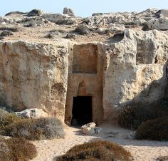 a cave in the middle of some rocks