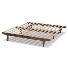 a bed frame made out of wooden slats