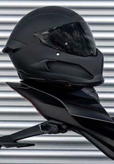 the helmet is on top of the motorcycle