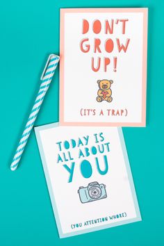 two greeting cards with the words, don't grow up and it's a trap