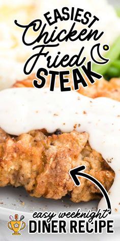 chicken fried steak on a plate with ranch dressing