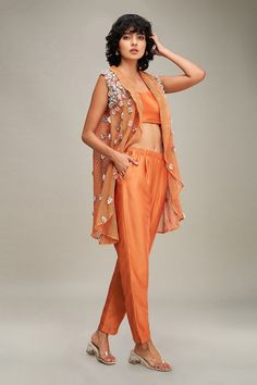 Orange handloom net high-low cape with floral and beaded hand embroidery. Comes with chanderi pant and a bustier. - Aza Fashions Summer Festive Palazzo Set With Cape Sleeves, Festive Sets With Sheer Dupatta For Spring, Spring Festive Sets With Sheer Dupatta, Spring Georgette Sets With Sheer Dupatta, Spring Saree Set With Mirror Work, Bollywood Style Sets With Mirror Work For Spring, Summer Sets With Sheer Dupatta And Cape Sleeves, Bollywood Style Sets With Sheer Dupatta For Spring, Party Sets With Sheer Dupatta For Spring