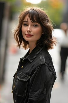 Playful and edgy jagged bob with bangs, adding a dynamic, youthful vibe to a fashion-forward style Textured Bob Hairstyles, Bob With Bangs