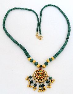 "Vintage antique solid 22 K gold Kundan work pendant necklace. Uncut diamond set with rubies and emeralds in very classic style strung with natural Emerald and gold beads. Total Length of necklace-46 cm(18 \") we can adjust length. size of only pendant-4/2.5 cm, total weight-25 grams(0.87 ounces), Net gold weight approx-15 grams(0.52 ounces)." Traditional Emerald Necklaces For Anniversary, Traditional Green Emerald Necklace In 22k Gold, Traditional Hand Set Emerald Necklace For Anniversary, Gold Emerald Necklace With Gemstone Beads, Traditional Jeweled Necklaces For Anniversary, Emerald Necklace With 17 Jewels For Celebration, Traditional Hand-set Emerald Necklace For Anniversary, Traditional Emerald Necklace For Anniversary, Green Kundan Necklace In 22k Gold As Gift