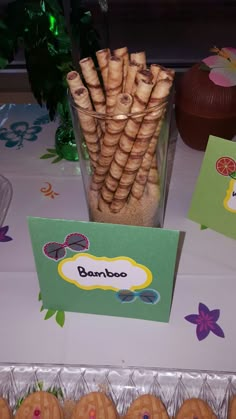 there are cookies and crackers on the table next to each other, along with greeting cards