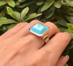 "A genuine large rectangular-shaped faceted Blue Turquoise, Robins Egg Blue Hue aka Sleeping Beauty, set on a minimalist bezel is a great statement/cocktail ring. Made to order in your choice of metal 14k Yellow Gold, Rose Gold or White Gold FINAL SALE Instagram Video ----------------- https://instagram.com/p/BiXzeTqlqIb/ https://instagram.com/p/Biuu4QnFZmJ/ https://instagram.com/p/BjstMbtlEEW/ Face measure 16mmx 18.7mm Shank width 3.5mm Sits off the finger 5.7mm ----> Please note there is an Turquoise Emerald Cut Rings For Gift, Emerald Cut Turquoise Rings For Gift, Emerald Cut Turquoise Rings As Gift, Elegant Rectangular Turquoise Ring, Turquoise Gold Ring, Minimal Ring, Moonstone Engagement Ring, Black Halo, Morganite Ring