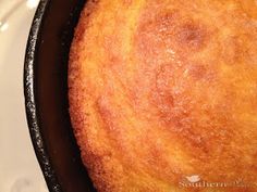 a close up of a cake in a pan on a stove