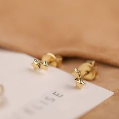 Stella Shine twice as bright with the Solid Gold Double Star Studs. Crafted from 14k gold (available in yellow, white, or rose gold), these earrings feature two delicate star silhouettes, each sparkling for a touch of celestial style. - Handmade- Solid gold- Dimensions: 6 x 3 mm All Sarah Elise stud earrings come beautifully boxed in suede pouches you can always use when traveling! Star Silhouette, Star Stud Earrings, Largest Butterfly, Ear Climbers, Star Earrings Stud, Jewelry Statement, Star Studs, White Gift Boxes, Rose Gold Earrings