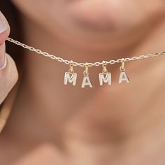 The A-Z of you and me. Create your own personalized alphabet with our Mini Alphabet Charm Necklace. Choose up to 5 delicate letter charms to represent treasured loved ones or use the letters to spell out your own special words. 18K Champagne Gold Plated or 925 Sterling SilverMini Alphabet Charm: 0.2Charms are removable from this chain and can be worn on all Merci Maman chain lengthsSent with love in a complimentary gift box Alphabet Charm, Special Words, Mini Charm, Letter Charms, Champagne Gold, Chain Styles, Chain Lengths, Gift Bag, Lettering Alphabet