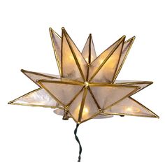 a star shaped light fixture on a white background