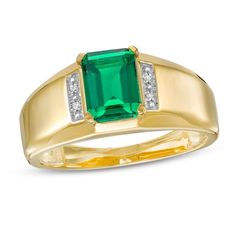 Bring a hint of color to his look with this smart fashion ring. Crafted in warm 10K gold, this design features an 8.0 x 6.0mm emerald-cut verdant-green lab-created emerald flanked by diamond-accented collars. The shank gleams with beveled edges for added dimension and depth. Buffed to a brilliant luster, this ring is a sophisticated style just for him. Gold Rings Zales, Gold Colour Ring, Gents Gemstone Ring, Black And Emerald Mens Ring, Emerald Mens Ring White Gold, Emerald Ring Design, Mens Ring Designs, Smart Fashion, Verdant Green