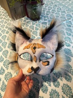 Hi this will only be up for 3 more days This is a calico/orange cat mask mix! (psst! it's half airbrushed and half hand painted! also it has bendable ears!) ~materials~ -felt -hot glue -acrylic paint -wire -eva foam -paper cat mask *made in household with dog* Cat Ears Masks With Whiskers For Masquerade, Halloween Cosplay Cat Design Mask, Masquerade Cat Ears Mask With Whiskers, Halloween Cosplay Hand Painted Masks, Halloween Cat Ears Mask With Whiskers, Cosplay Cat Design Mask, Halloween Masquerade Masks With Whiskers, Foam Paper, Paper Cat