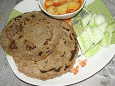 a plate with some food on it and a bowl of soup