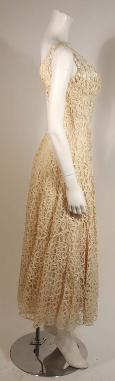 For Sale on 1stDibs - This Ceil Chapman cocktail dress is composed of a fabulous cream lattice work lace. There is a side zipper for ease of access. There is slight discoloration, Ceil Chapman, Lace Cocktail Dress, Cocktail Dress Lace, Lattice, Side Zipper, Evening Dresses, Cocktail Dress, Zipper, Cream