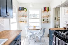 the kitchen is clean and ready to be used for cooking, dining or as an entertaining space