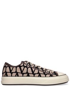 Front lace-up closure. All over logo pattern placement may vary. Rubber sole Brown Low-top Sneakers With Logo Print, Beige Sneakers, Versace Brand, Logo Pattern, Print Placement, Low Top Sneakers, Black Sneakers, Heeled Loafers, Canvas Sneakers