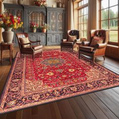 a living room filled with furniture and a red rug on top of a hard wood floor