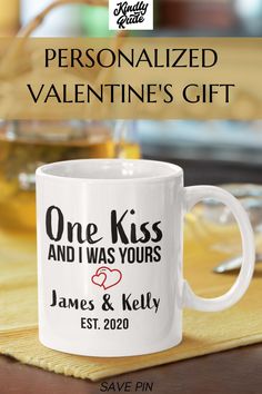 the personalized valentine's gift mug is shown on a table with wine glasses